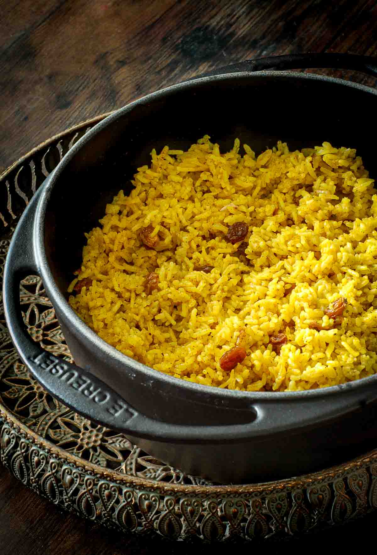 Black cast iron pot with yellow rice