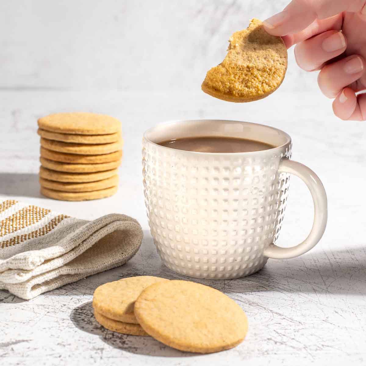 Dunking an outydse soetkoekie in a mug of coffee.