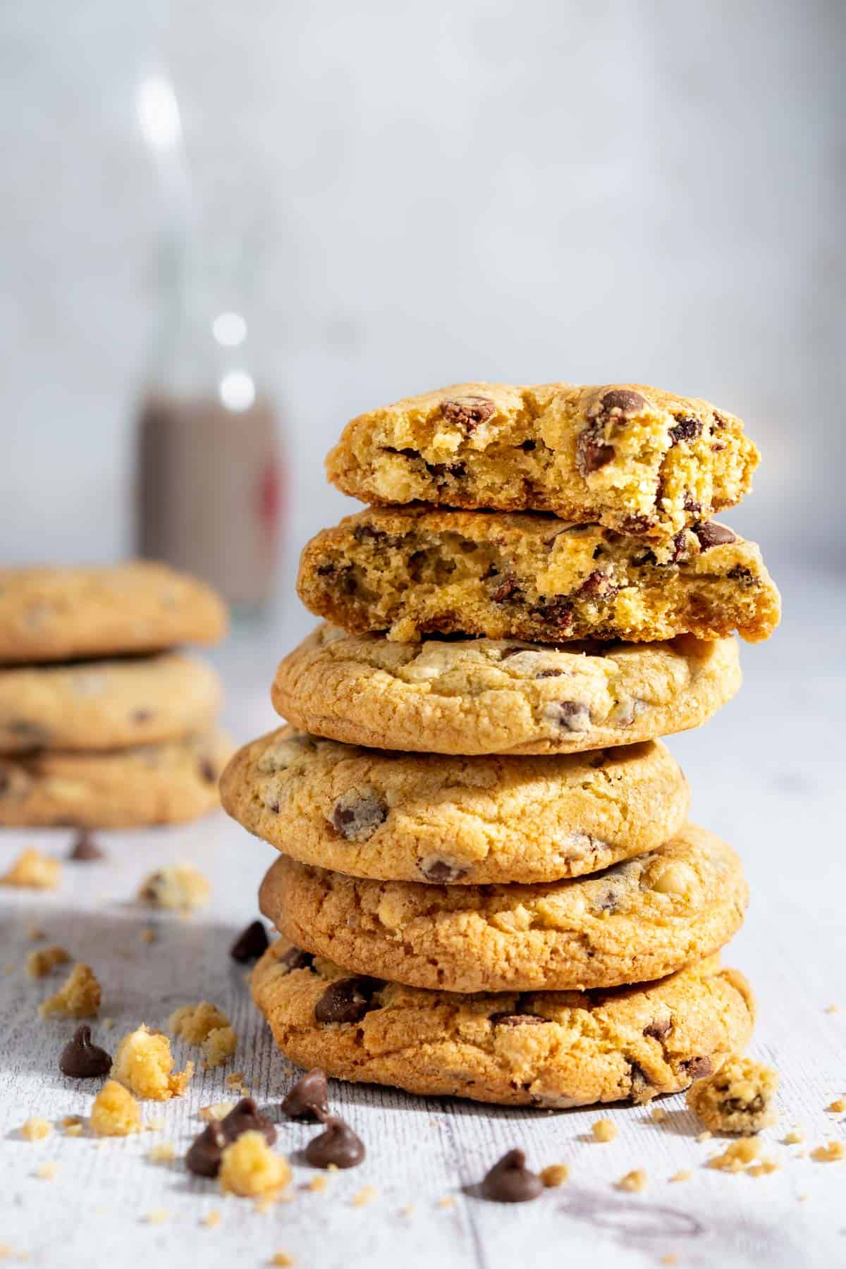 Five chocolate chip cookies without brown sugar stacked on top of each other.