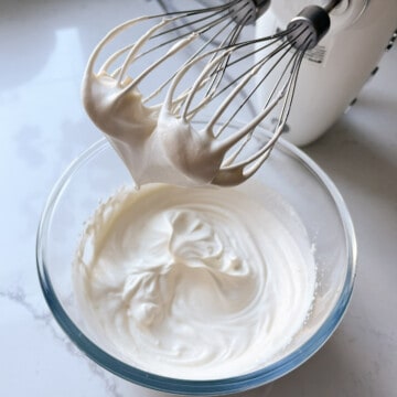 Milkybar cheesecake process - whip cream to soft peaks.