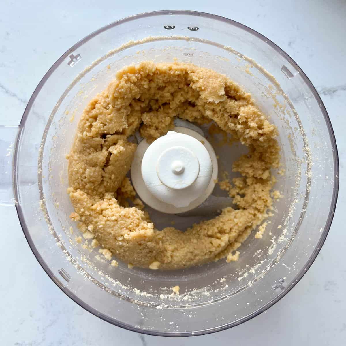 Milkybar cheesecake process - biscuit base mixture in blender.