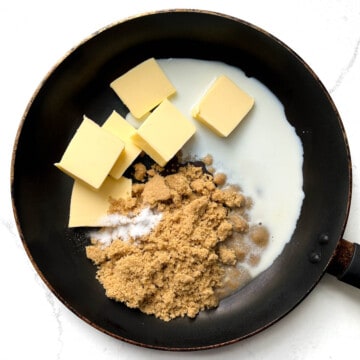 Adding brown sugar, butter, milk and salt to a large frying pan.