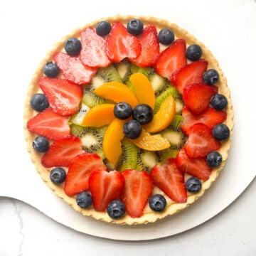 A completed tarte aux fruits tart without the gloss mixture painted on.