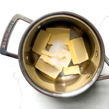 Cubed butter in a small saucepan with granulated sugar.