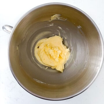 Mixed butter and sugar in the bowl of a stand mixer.