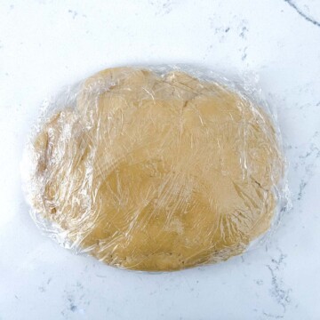 Pastry for the tarte aux fruit wrapped up in plastic film.