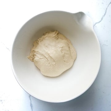 Rundstykker dough in a large mixing bowl after kneading.