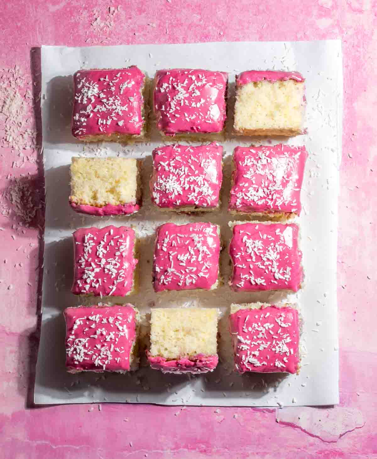 Tottenham cake squares on a pink background.