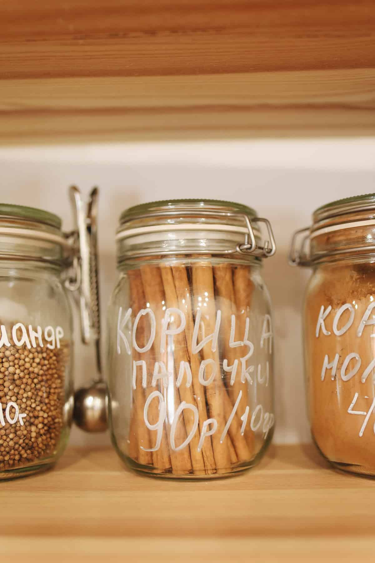 A jar of cinnamon sticks.