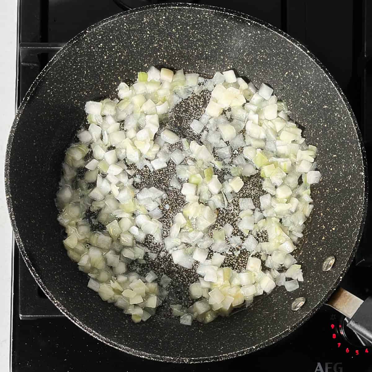 Frying onions in olive oil.