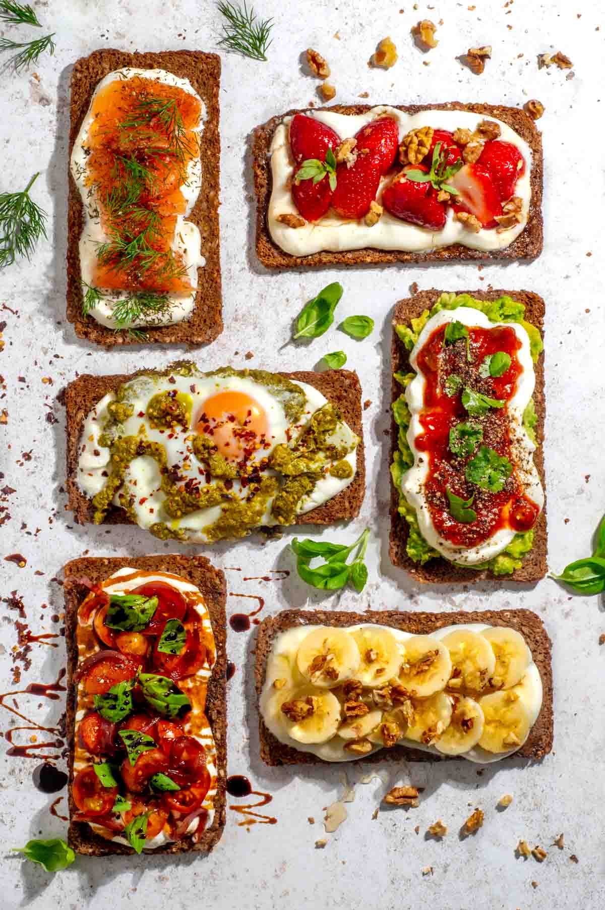 Size slices of toast with cottage cheese and various toppings.