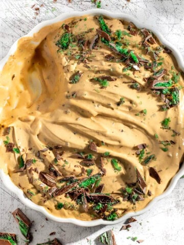 Peppermint crisp tart in a large round white dish.