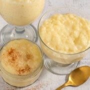 Creamy rice pudding with condensed milk in a bowl with cinnamon on top