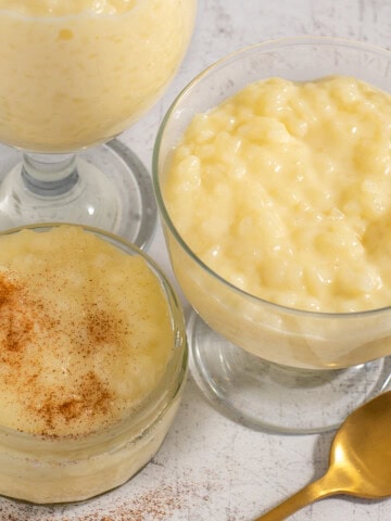 Creamy rice pudding with condensed milk in a bowl with cinnamon on top